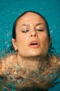 Beautiful woman in a swimming pool. Royalty Free Stock Photo