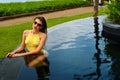 Beautiful Woman In Swimwear Relaxing In Swimming Pool. Summer Vacations Royalty Free Stock Photo