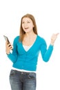 Beautiful woman with tablet shows thumb up