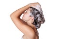 Beautiful woman taking a shower and shampooing her hair. washing hair with Shampoo. Royalty Free Stock Photo