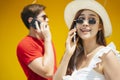 Beautiful woman talking on the phone with boyfriends in summer Royalty Free Stock Photo
