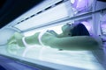 Beautiful woman tanning in solarium Royalty Free Stock Photo