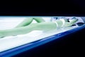 Beautiful woman tanning in solarium Royalty Free Stock Photo