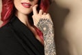 Beautiful woman with tattoos on arm against background, closeup Royalty Free Stock Photo