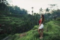 Pretty woman in tegalalang rice terrace fields in morning sunrise, Ubud, Bali, Indonesia. Royalty Free Stock Photo