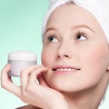 Beautiful woman tender jar of moisturizer cream Royalty Free Stock Photo