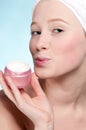 Beautiful woman tender jar of moisturizer cream Royalty Free Stock Photo