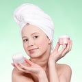 Beautiful woman tender jar of moisturizer cream. Royalty Free Stock Photo