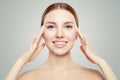 Beautiful woman touching her face in eyes area. Facial treatment, face lifting, anti aging and skin care concept Royalty Free Stock Photo