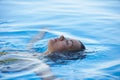 Beautiful Woman tourist in infinity pool Royalty Free Stock Photo