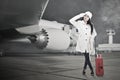 Beautiful woman travel in winter with luggage