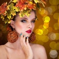 Beautiful woman with tree autmn ornament in head