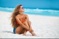 Beautiful woman on tropical beach