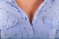 Beautiful woman with unbuttoned shirt to reveal her decollete Royalty Free Stock Photo