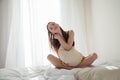 Beautiful woman in underwear in the bedroom on the bed Royalty Free Stock Photo