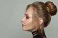 Beautiful woman with updo hair, female profile