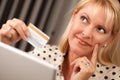 Beautiful Woman Using Laptop Holding Credit Card Royalty Free Stock Photo