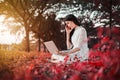 Beautiful woman using laptop in the park Royalty Free Stock Photo