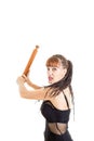 Beautiful woman using rolling pin for fight