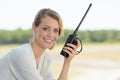 beautiful woman using walkie talkie Royalty Free Stock Photo