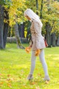 Beautiful woman walking in park Royalty Free Stock Photo
