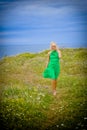 Beautiful woman walking by sea Royalty Free Stock Photo