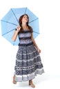 Beautiful woman walking under umbrella Royalty Free Stock Photo