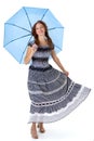 Beautiful woman walking under umbrella Royalty Free Stock Photo