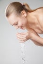 Beautiful woman washing her clean face with water Royalty Free Stock Photo