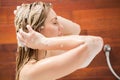 Beautiful woman washing her hair Royalty Free Stock Photo