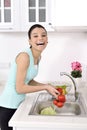 Beautiful woman Washing vegetables Royalty Free Stock Photo