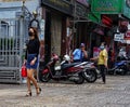 Beautiful woman watched by security guard