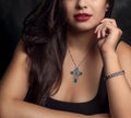 Beautiful woman wearing cross Necklace