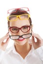 Beautiful woman wearing four different pairs of eyeglasses. Royalty Free Stock Photo