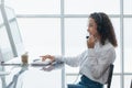 Beautiful woman wearing headsets worker call centre. working customer support service operator. Royalty Free Stock Photo