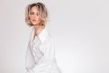 Beautiful woman wearing a large white shirt with open collar Royalty Free Stock Photo