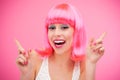 Beautiful woman wearing pink wig