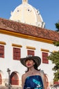 Beautiful woman wearing the traditional Colombian hat called Sombrero Vueltiao at the historical Calle de la Ronda of the Royalty Free Stock Photo