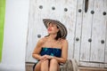 Beautiful woman wearing the traditional Colombian hat called Sombrero Vueltiao at the historical streets of the Cartagena de Royalty Free Stock Photo