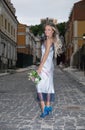 Beautiful woman with a wedding bouquet Royalty Free Stock Photo