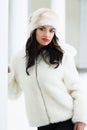 Woman in a white fur coat and hat Royalty Free Stock Photo