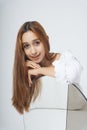 Beautiful woman in white shirt with natural make up isolated over white background. Skincare facial treatment.  Sexy woman in long Royalty Free Stock Photo