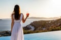 Woman enjoys the sunset over the Mediterranean sea Royalty Free Stock Photo