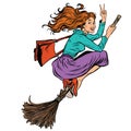 Beautiful woman witch flying on a broom Royalty Free Stock Photo