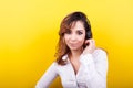 Beautiful woman working as a telemarketer wearing a headset