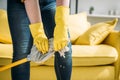 beautiful woman wringing out rag on mop