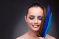 The beautiful woman with writing feather quill Royalty Free Stock Photo