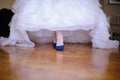 Beautiful woman& x27;s  legs in white wedding dress Royalty Free Stock Photo