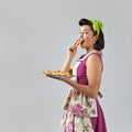 Beautiful woman with yummy biscuits. Royalty Free Stock Photo