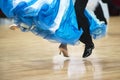 Beautiful womanish and masculine legs in active ballroom dance, Royalty Free Stock Photo